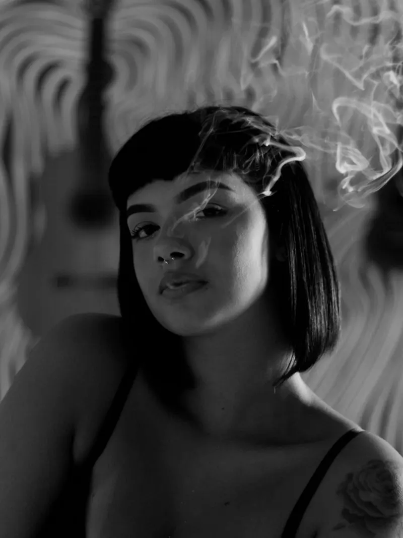 Portrait in drifting smoke